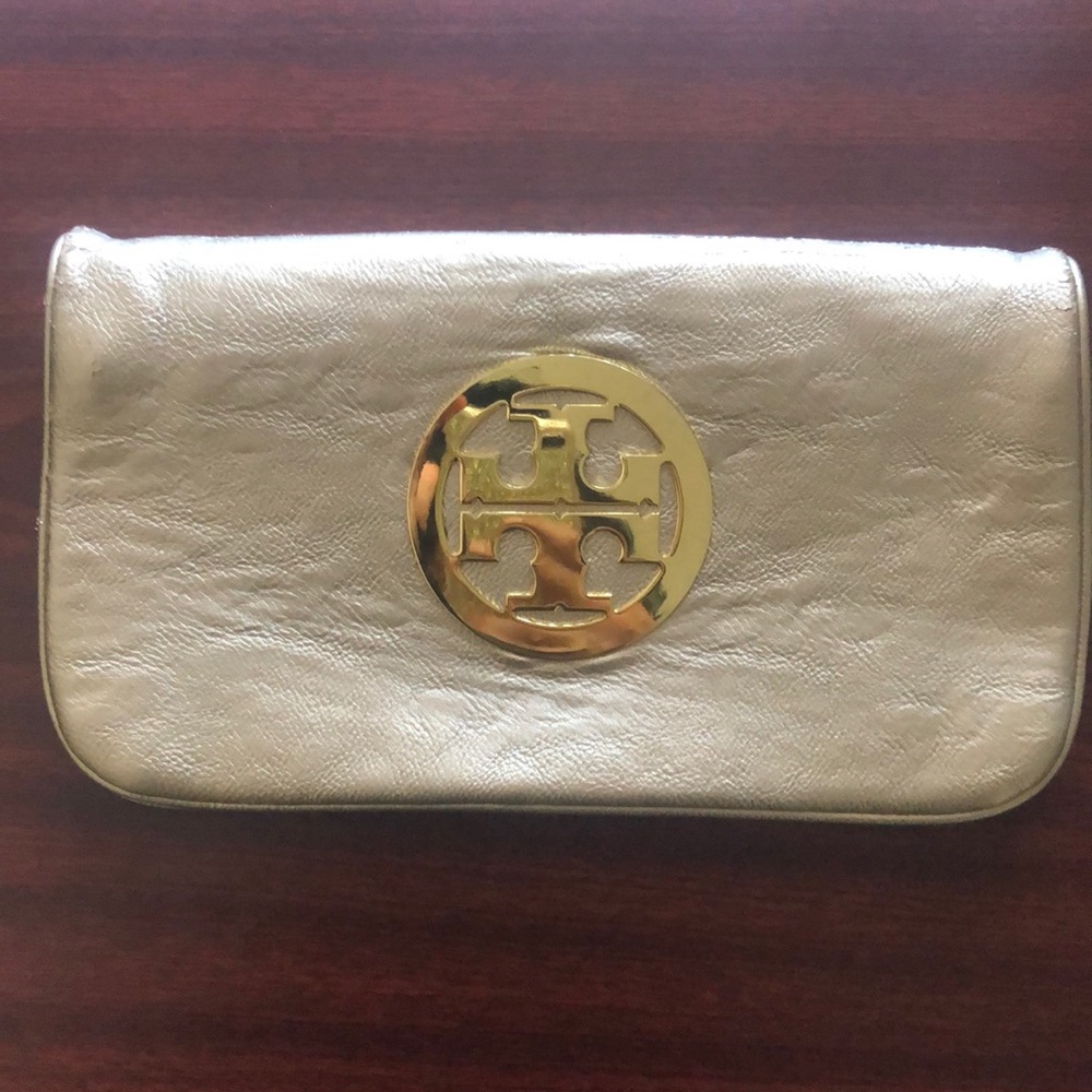 Metallic gold toned leather Tory Burch Reva Clutch